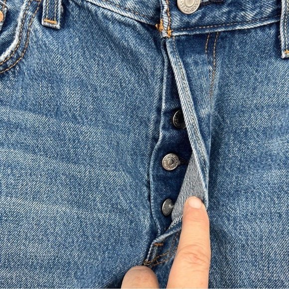 Levi's 501 medium wash button placket frayed raw edge whiskered denim shorts. - Picture 6 of 13